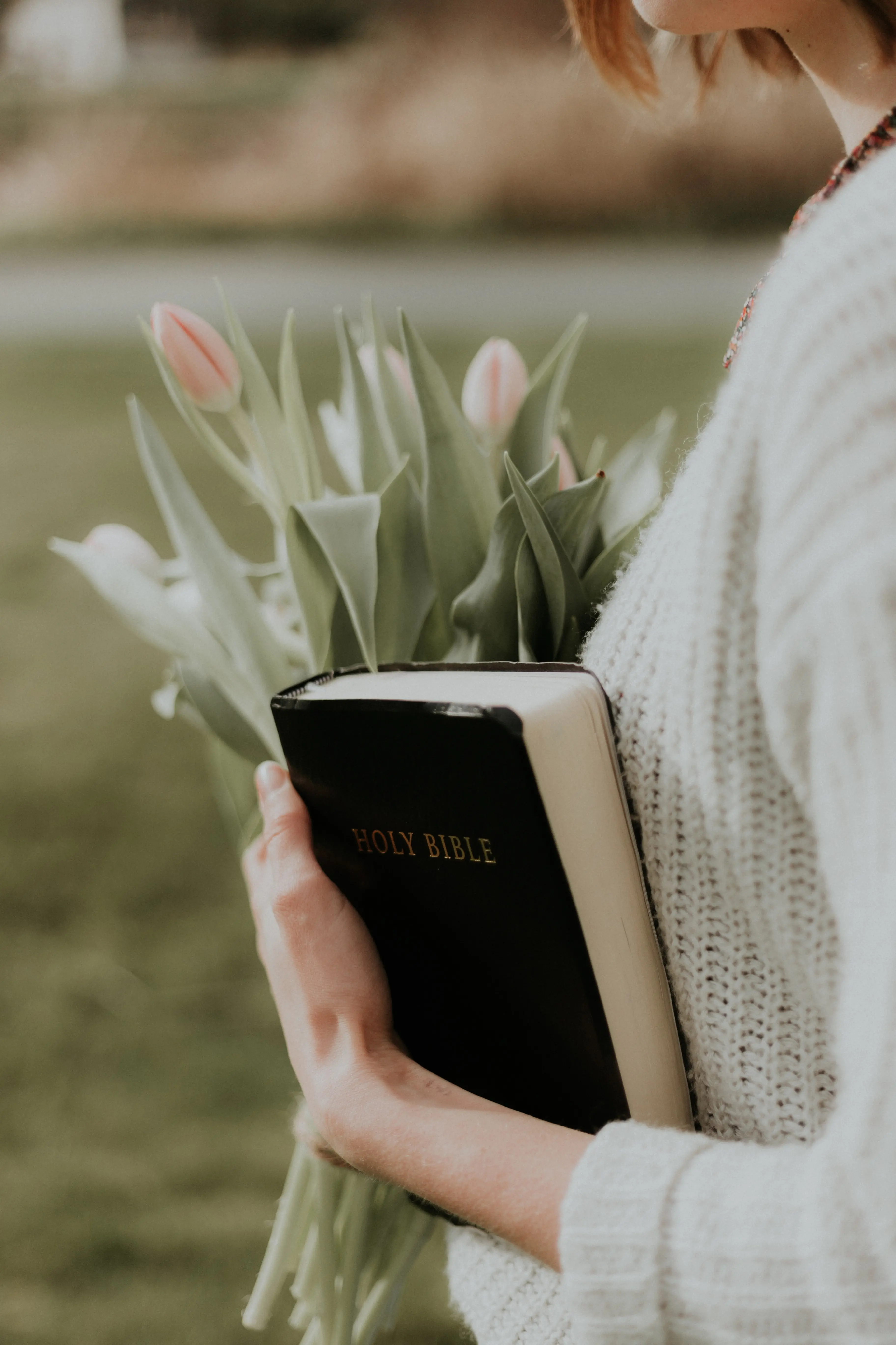 Woman holding Bible